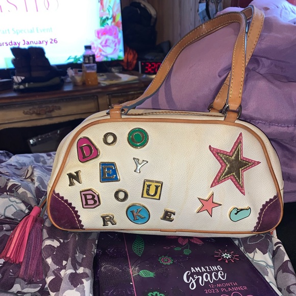 Dooney & Bourke Handbags - Rare Vintage Dooney&bourke Leather bag very unique
